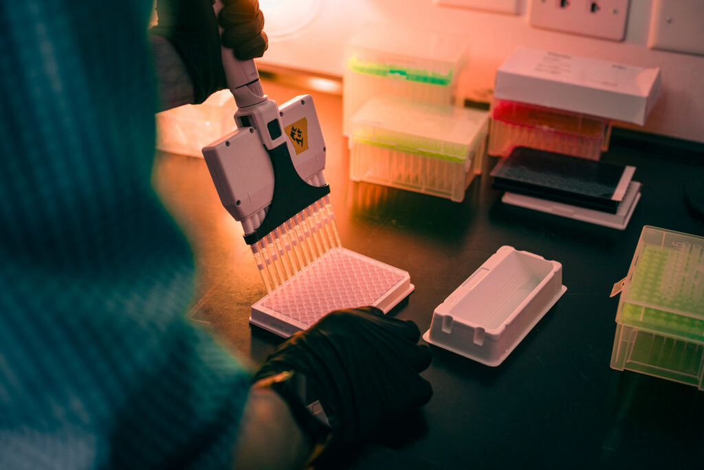 Multi-channel pipette performing tests for Antibody discovery and protein engineering
